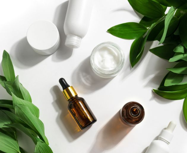organic skin care products and green plants
