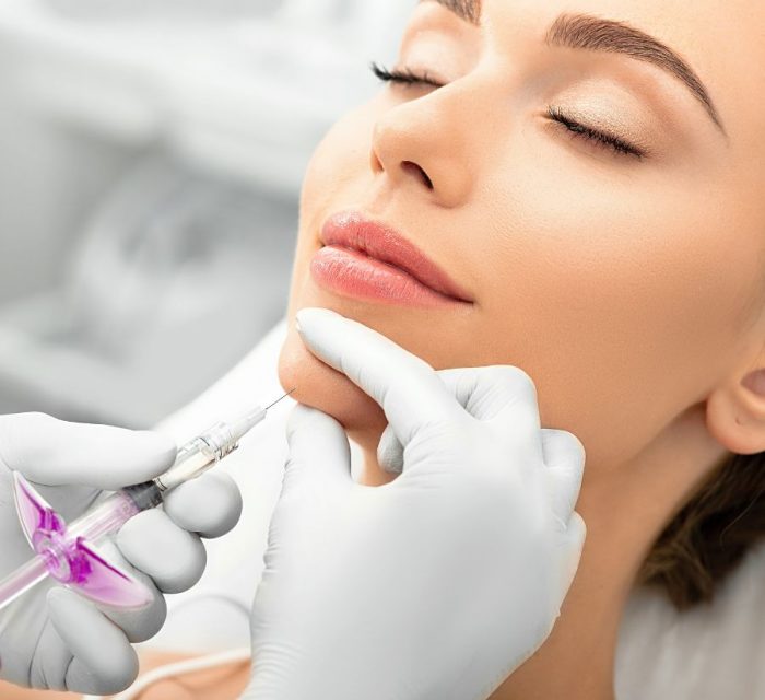 woman-during-skin-tightening-procedure-injection-of-dermal-filler-into-a-female-face-the-anti-aging-procedure